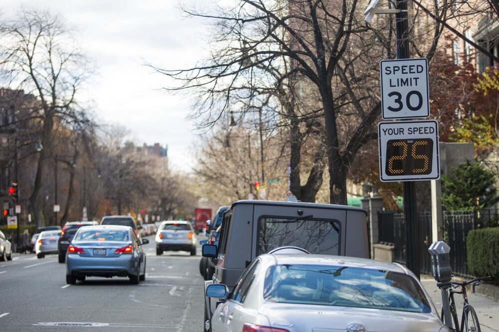 A radar speed display on Beacon Street shows 25 MPH, which the city of Boston announced will be the default speed limit beginning on January 9, 2017. (Jesse Costa/WBUR)